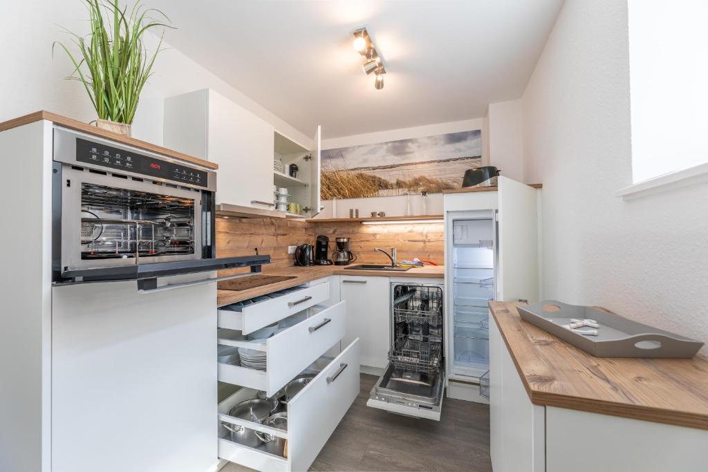 Kuchyň nebo kuchyňský kout v ubytování Haus Inselanker Kajüte 10