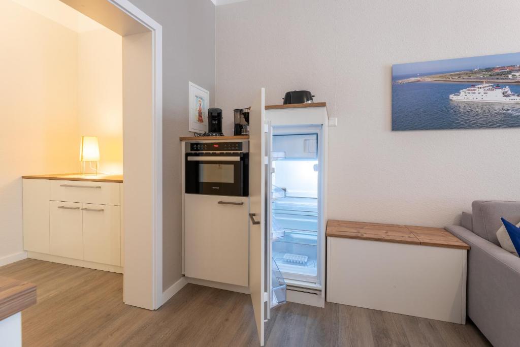 Kuchyň nebo kuchyňský kout v ubytování Haus Inselanker Kajüte 07