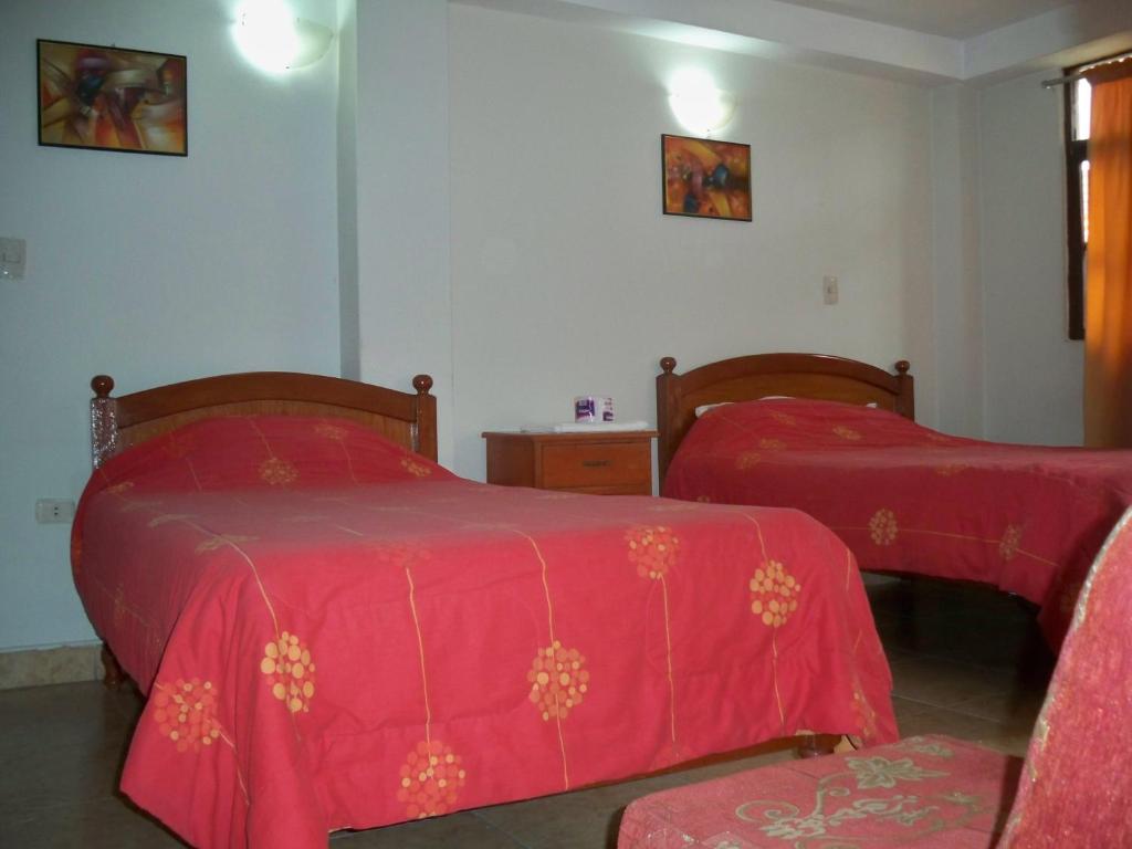 Postel nebo postele na pokoji v ubytování El Balcon Hostal
