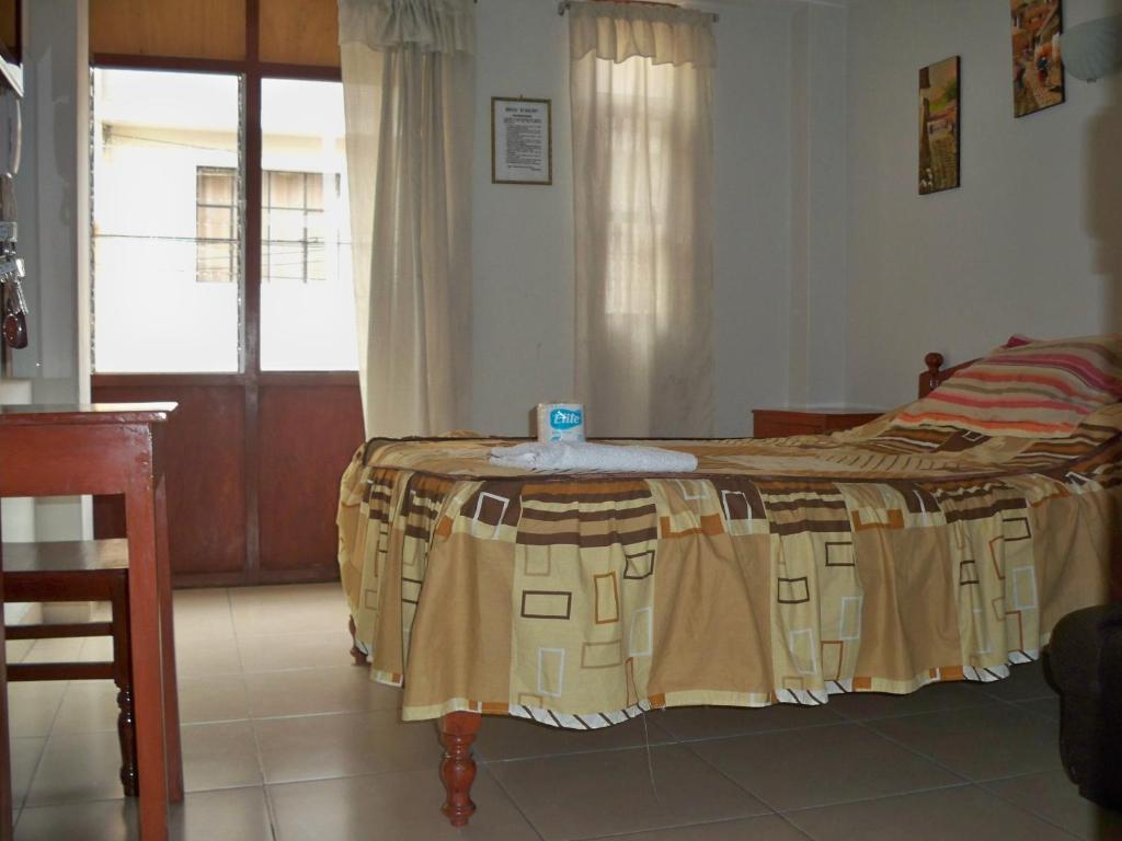 Postel nebo postele na pokoji v ubytování El Balcon Hostal
