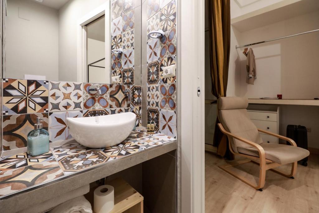 Koupelna v ubytování D'Angiò Rooms-Manfredi Homes&Villas