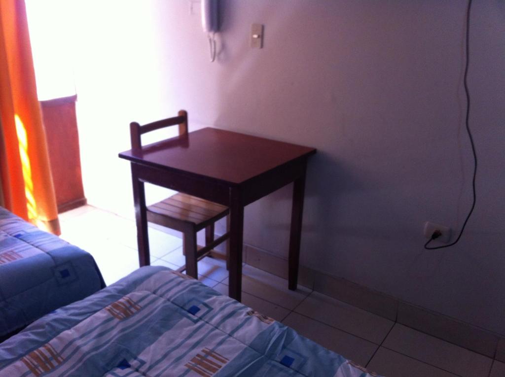 Postel nebo postele na pokoji v ubytování El Balcon Hostal