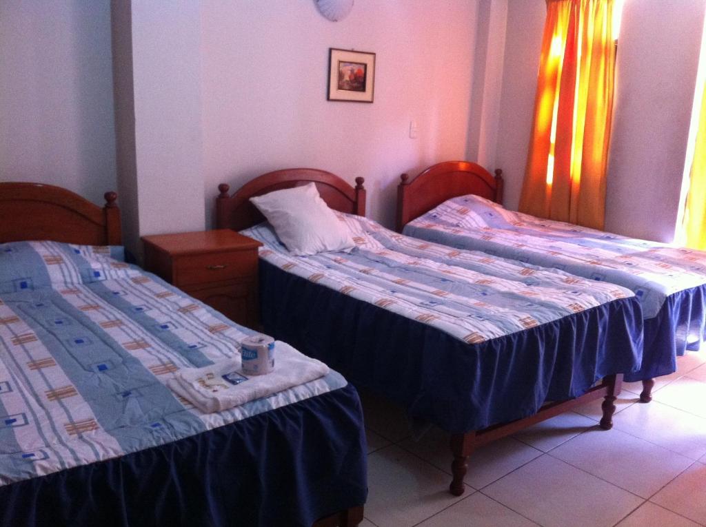 Postel nebo postele na pokoji v ubytování El Balcon Hostal
