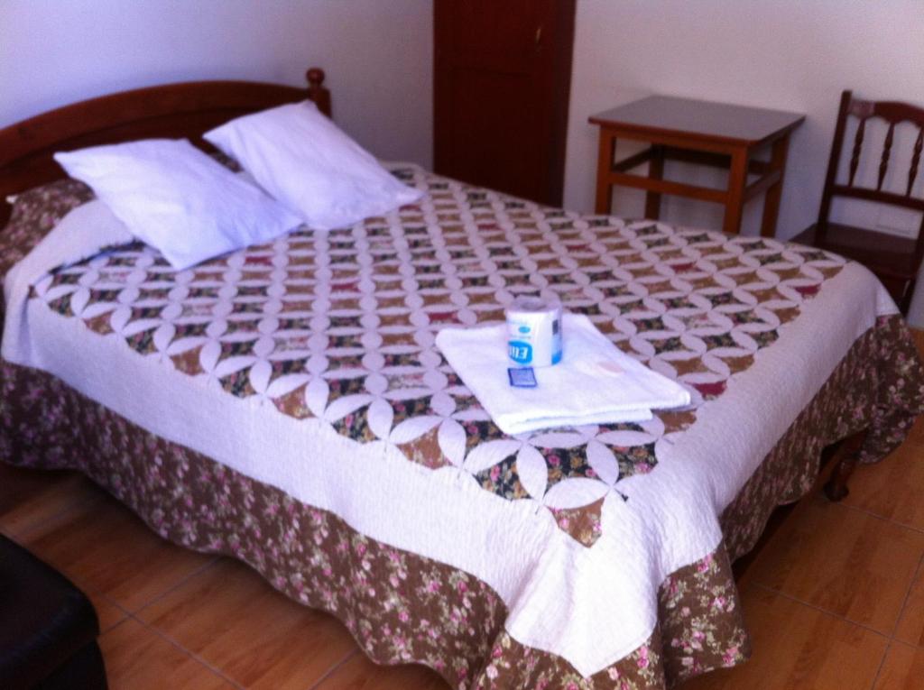 Postel nebo postele na pokoji v ubytování El Balcon Hostal