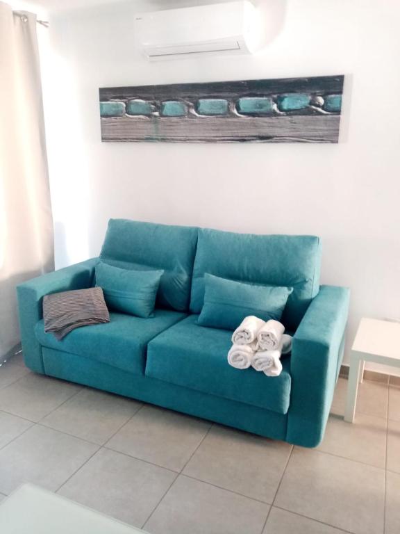 A seating area at Sunny pool view & Airco apartament Symon Mareverde