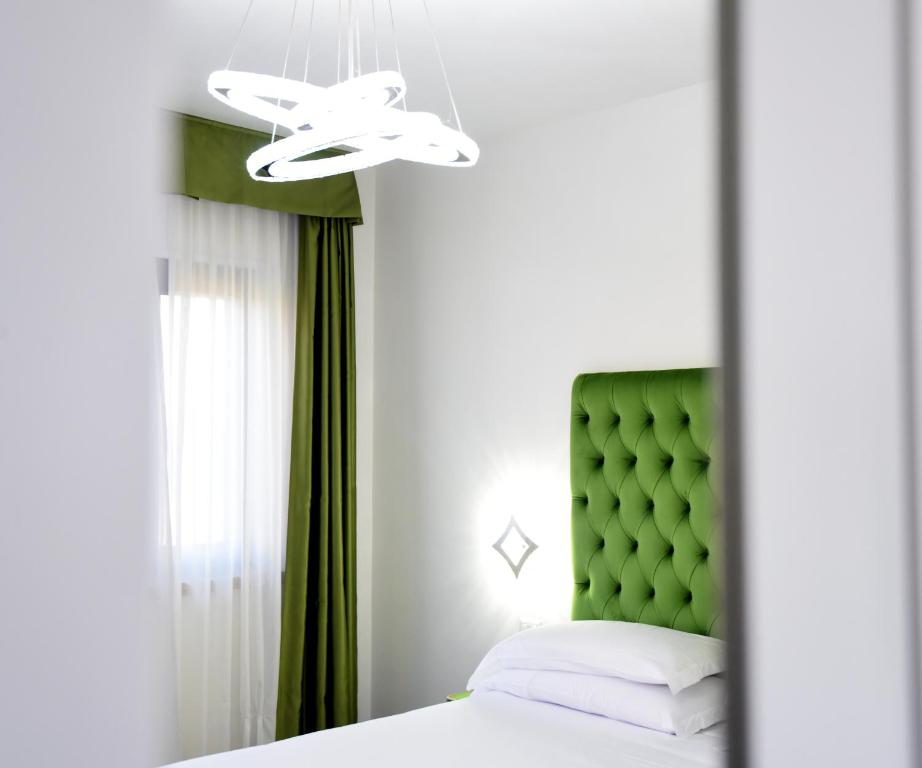 Postel nebo postele na pokoji v ubytování Agriturismo Borgo Imperiale