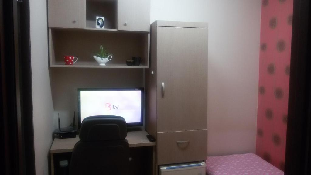 TV a/nebo společenská místnost v ubytování 아이원리빙텔