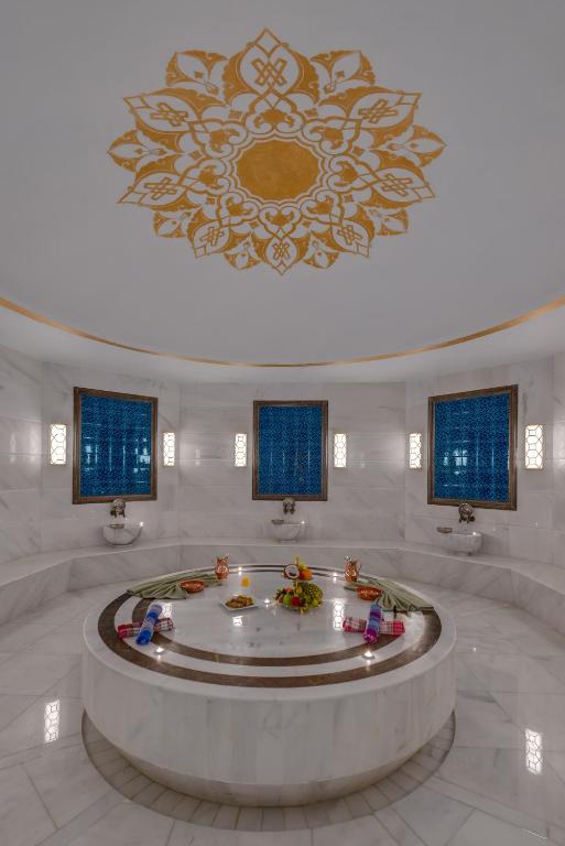 a large room with a large fountain in a building at Rixos Premium Tekirova - The Land of Legends Access in Tekirova