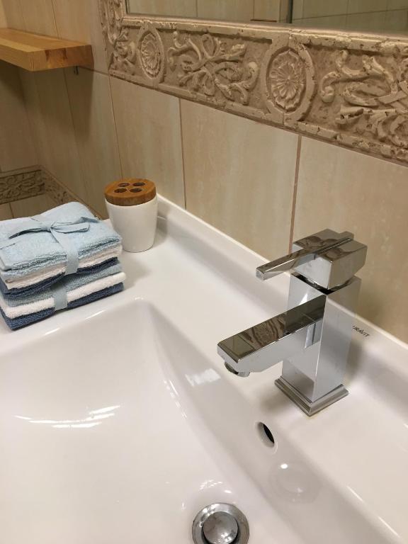 Kúpeľňa v ubytovaní Apartament