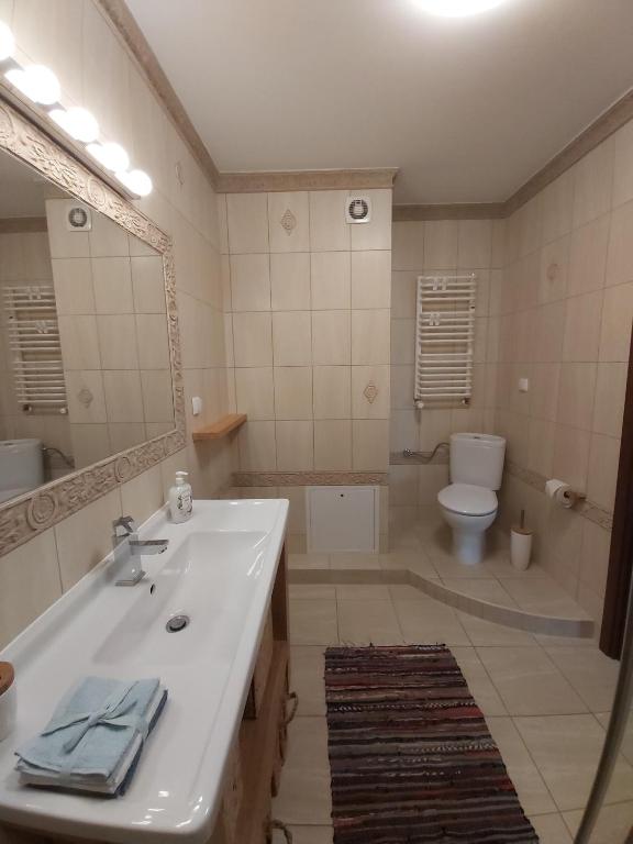 Kúpeľňa v ubytovaní Apartament
