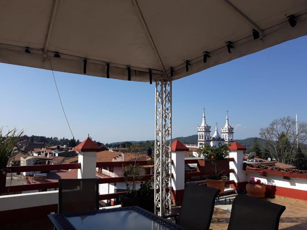 Balkón nebo terasa v ubytování Hotel el Leñador