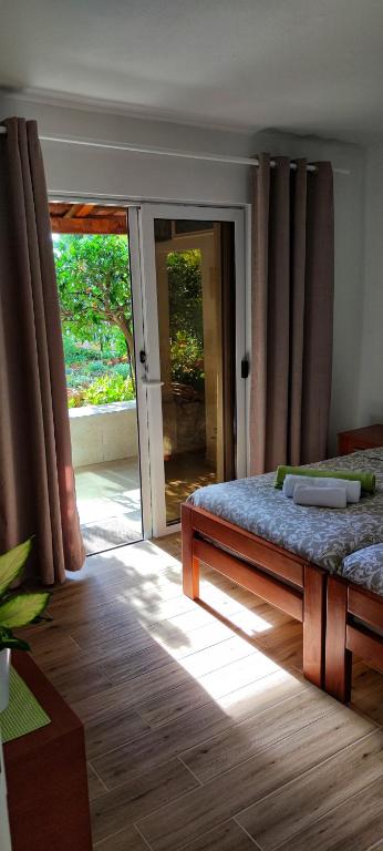 Postel nebo postele na pokoji v ubytování Apartments Mare