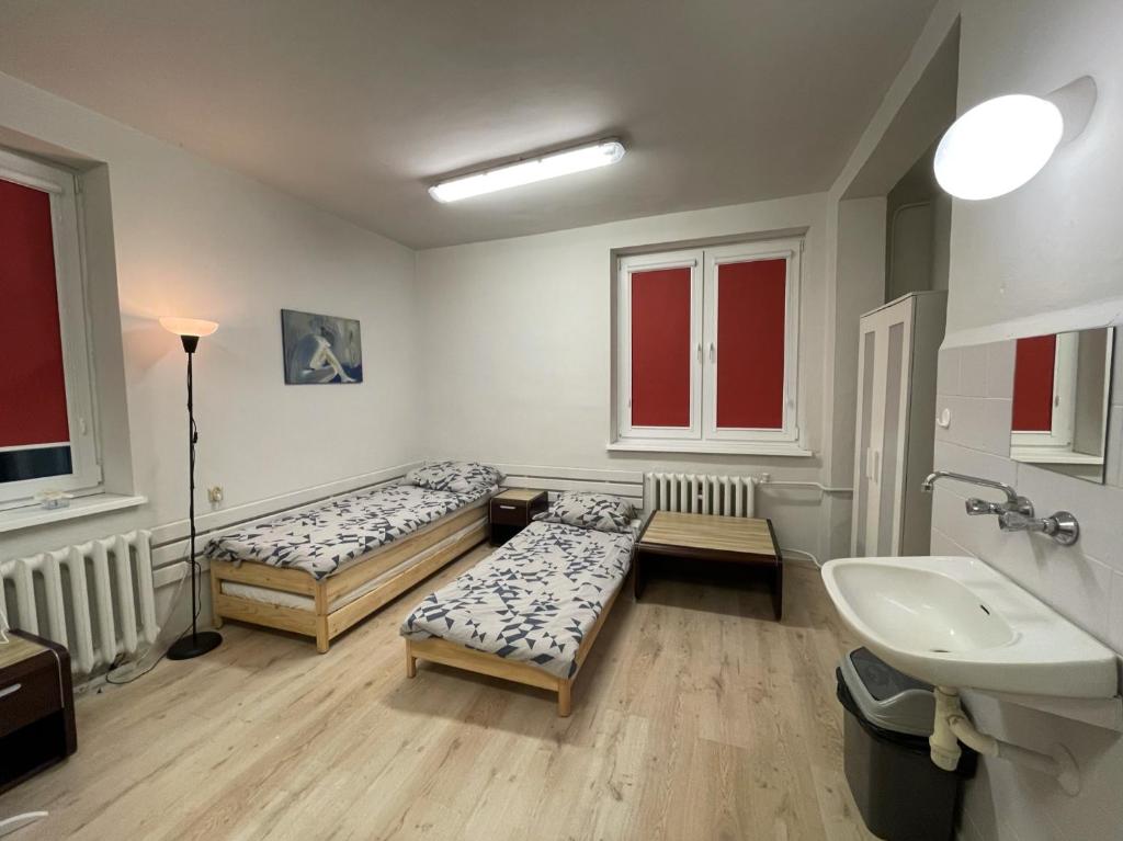 Postel nebo postele na pokoji v ubytování Noclegi - Ośrodek na Klifie Village - Hel Helska 11