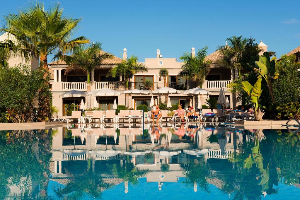 a view of a resort with a swimming pool at Marylanza Suites & Spa in Playa de las Americas