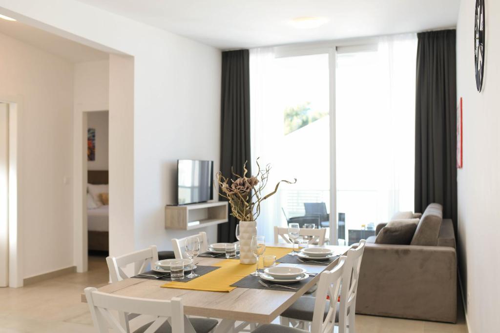 Televízia a/alebo spoločenská miestnosť v ubytovaní A&V Residence