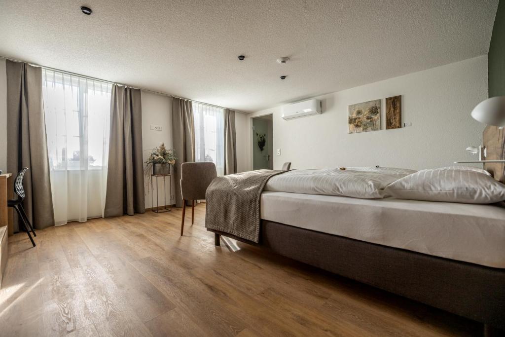 Postel nebo postele na pokoji v ubytování Hotel & Restaurant Bären