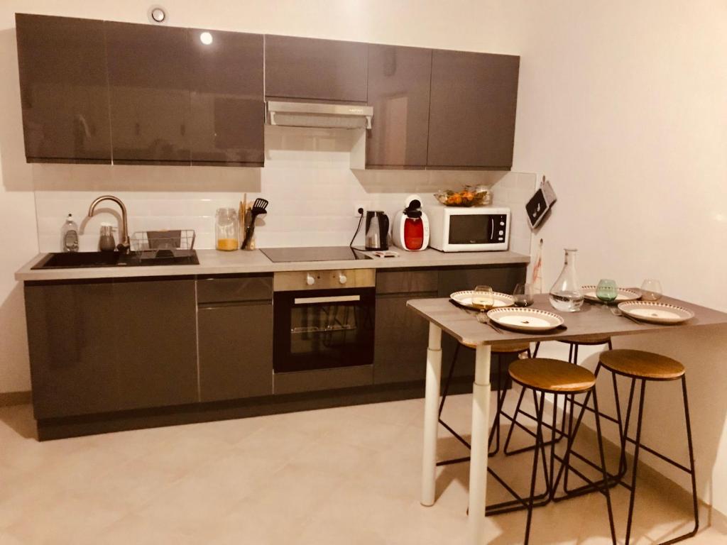 Η κουζίνα ή μικρή κουζίνα στο Appartement 23