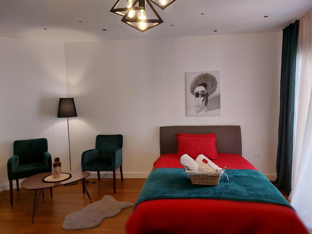 Postel nebo postele na pokoji v ubytování Aria Apartmani