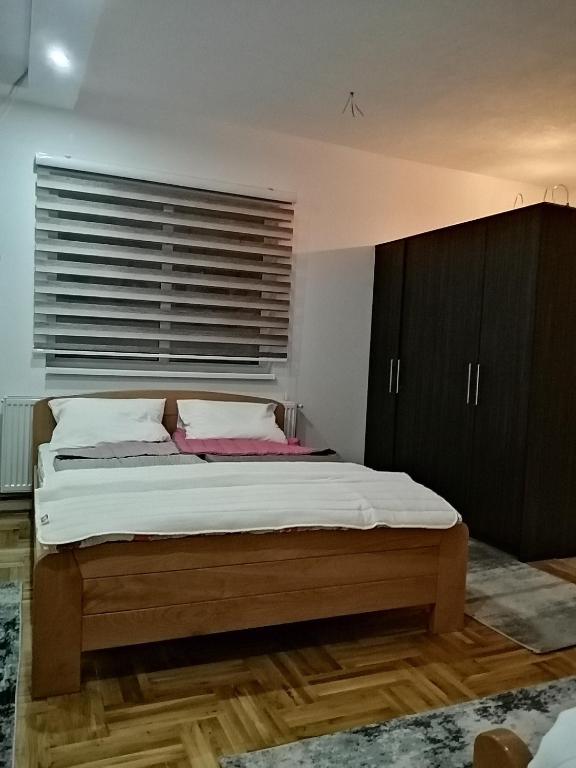 Postel nebo postele na pokoji v ubytování ORTODOKS