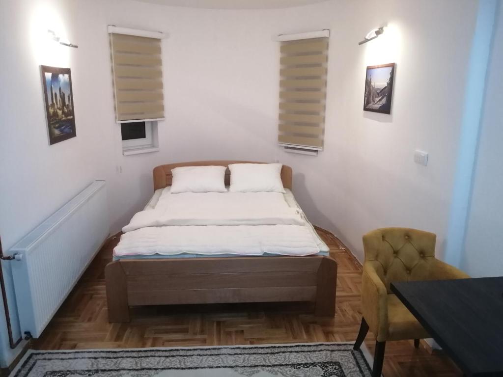 Postel nebo postele na pokoji v ubytování ORTODOKS