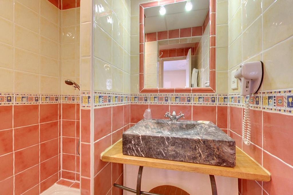 Koupelna v ubytování Hotel du Mas