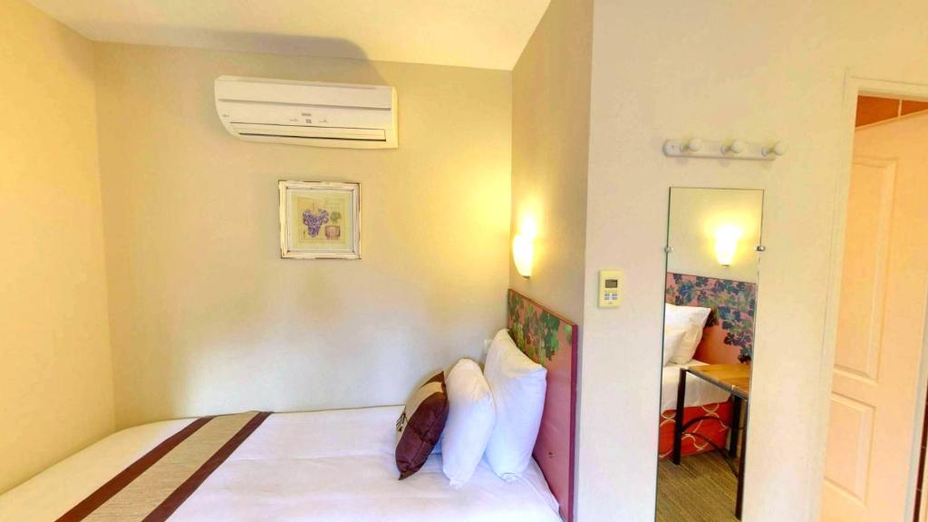 Postel nebo postele na pokoji v ubytování Hotel du Mas