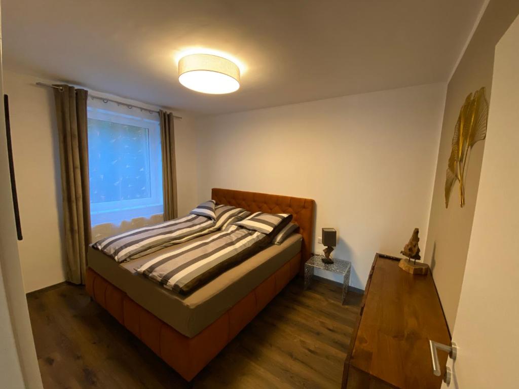Postel nebo postele na pokoji v ubytování Living8-Appartements