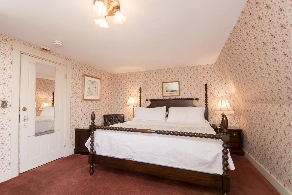 a bedroom with a large bed in a room at Marshall Slocum Inn in Newport