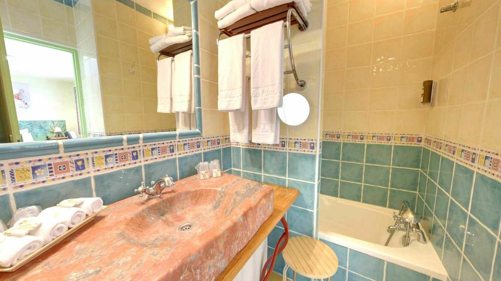 Koupelna v ubytování Hotel du Mas