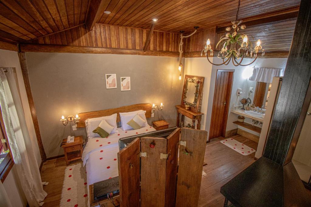 Postel nebo postele na pokoji v ubytování Pousada Infinito