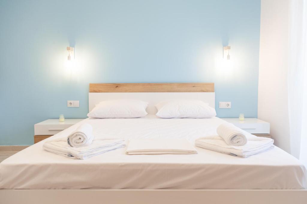 Postel nebo postele na pokoji v ubytování Diamanti Apartments Downtown Limenas Thasos