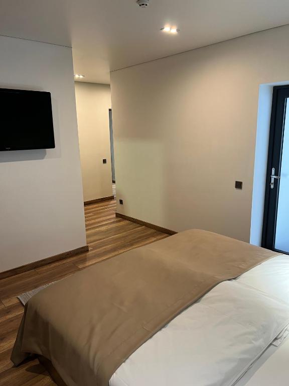 Postel nebo postele na pokoji v ubytování Loft wood