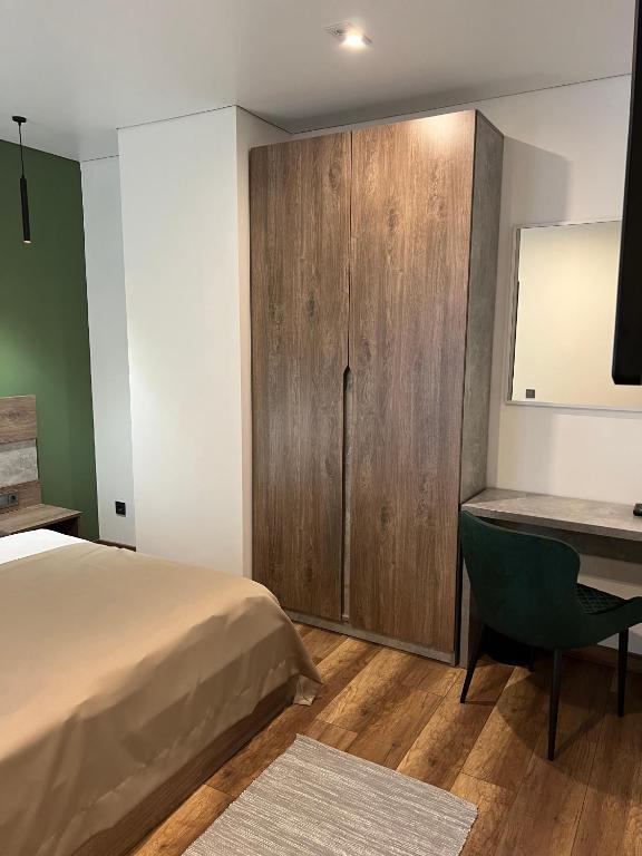 Postel nebo postele na pokoji v ubytování Loft wood