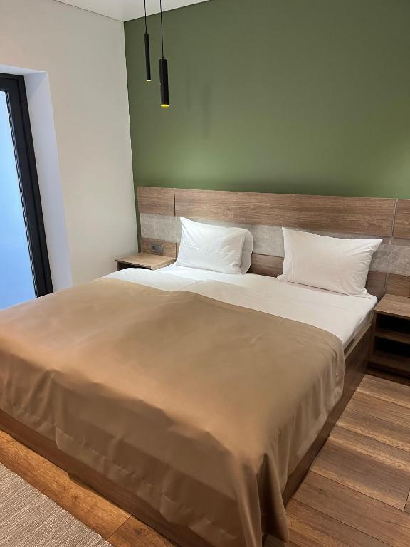Postel nebo postele na pokoji v ubytování Loft wood