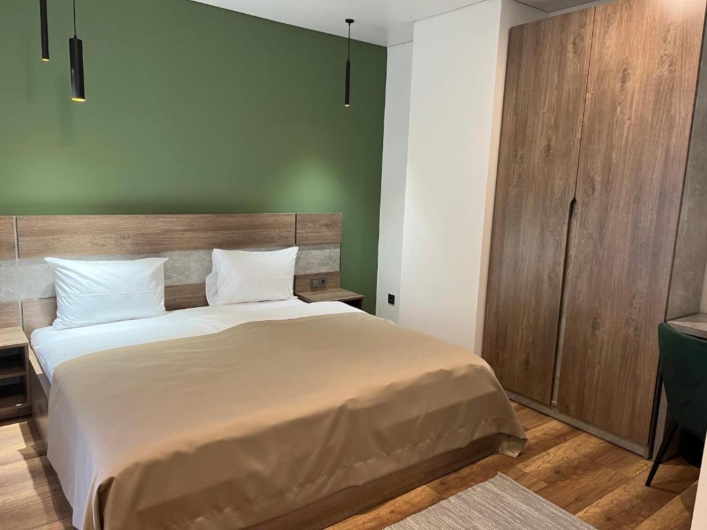 Postel nebo postele na pokoji v ubytování Loft wood