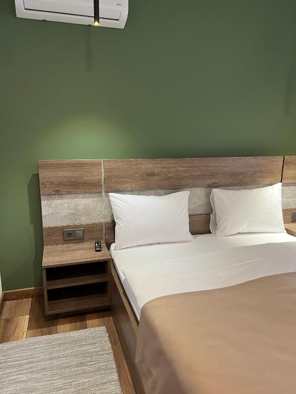 Postel nebo postele na pokoji v ubytování Loft wood