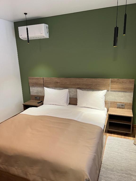 Postel nebo postele na pokoji v ubytování Loft wood