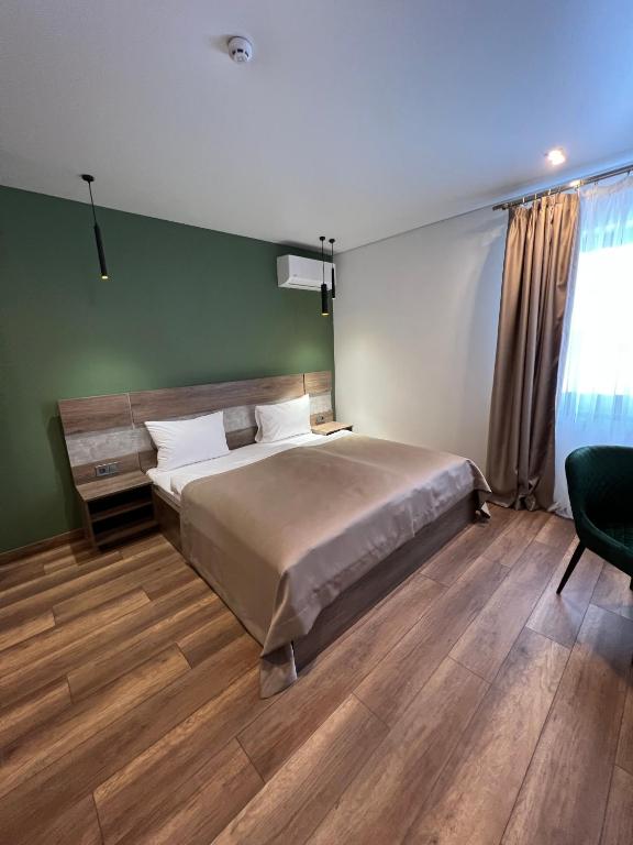 Postel nebo postele na pokoji v ubytování Loft wood