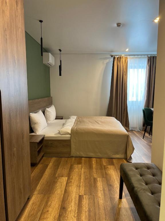 Postel nebo postele na pokoji v ubytování Loft wood