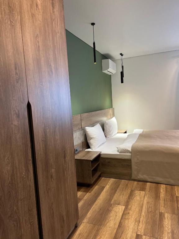 Postel nebo postele na pokoji v ubytování Loft wood