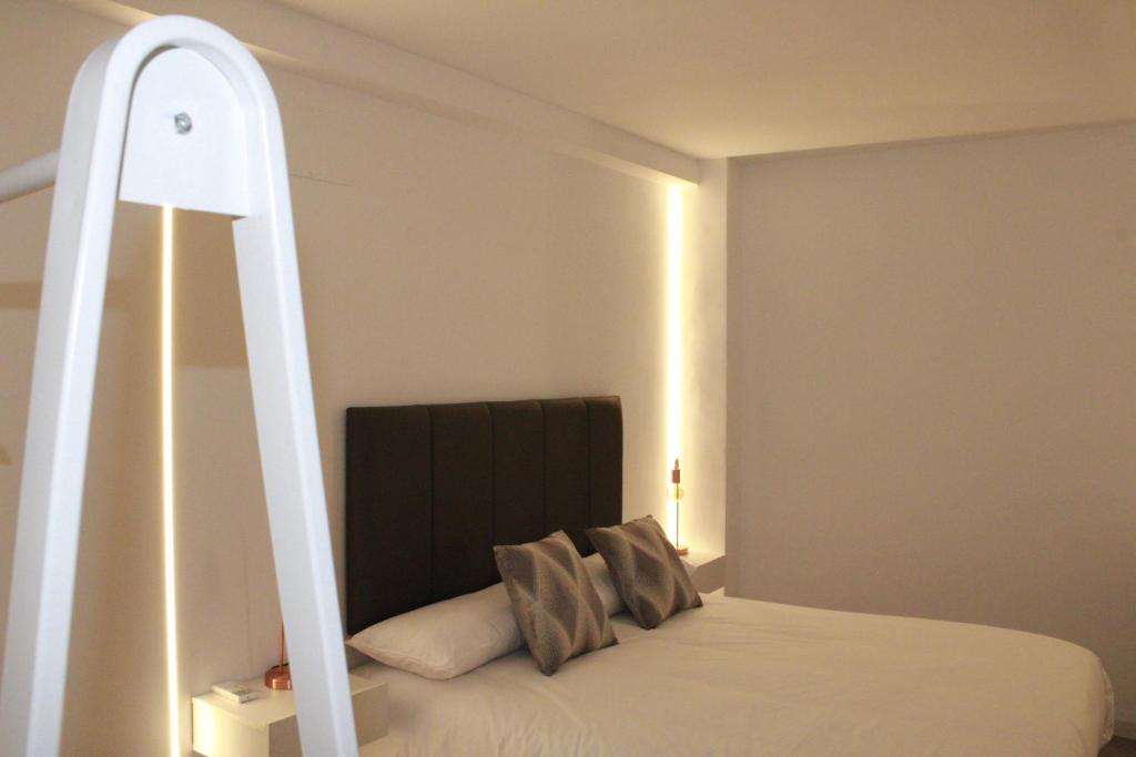 Postel nebo postele na pokoji v ubytování Casa Rural Plaza Santa Ana