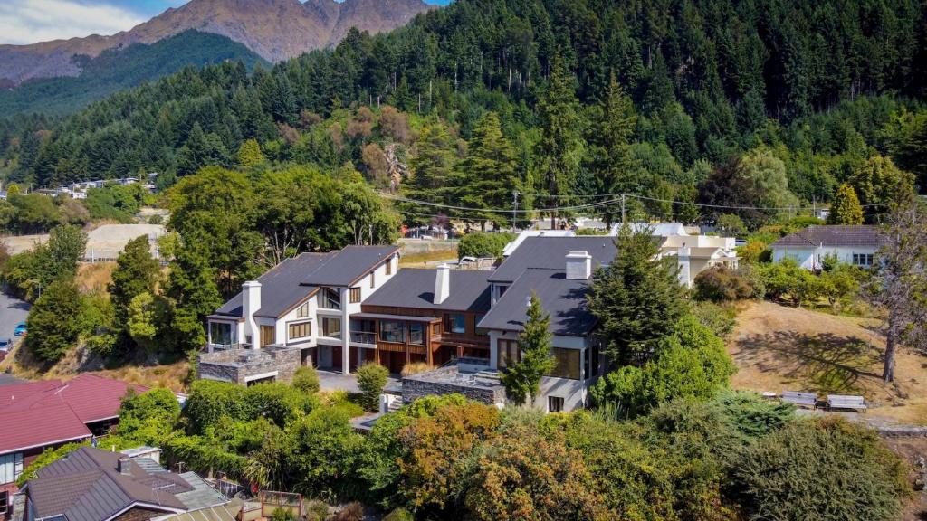 an aerial view of a house in the mountains at Brunswick Lodge - Luxury - Central Queenstown in Queenstown