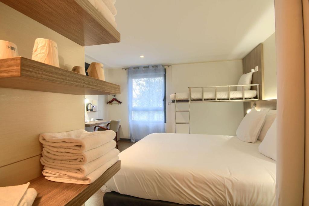 Postel nebo postele na pokoji v ubytování Sure Hotel by Best Western Reims Nord