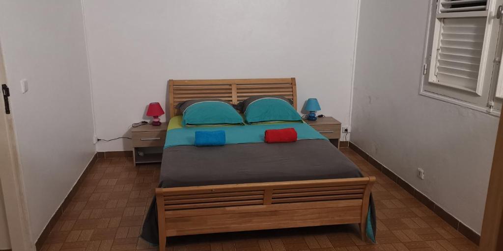 Postel nebo postele na pokoji v ubytování Loue maison en Martinique