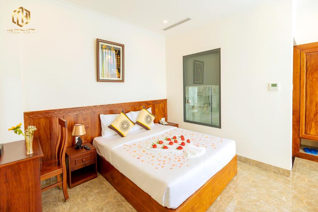 Giường trong phòng chung tại Thọ Hướng Hotel - Phan Thiết