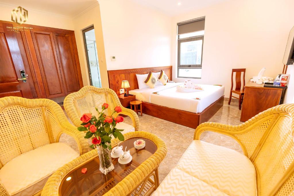 Giường trong phòng chung tại Thọ Hướng Hotel - Phan Thiết