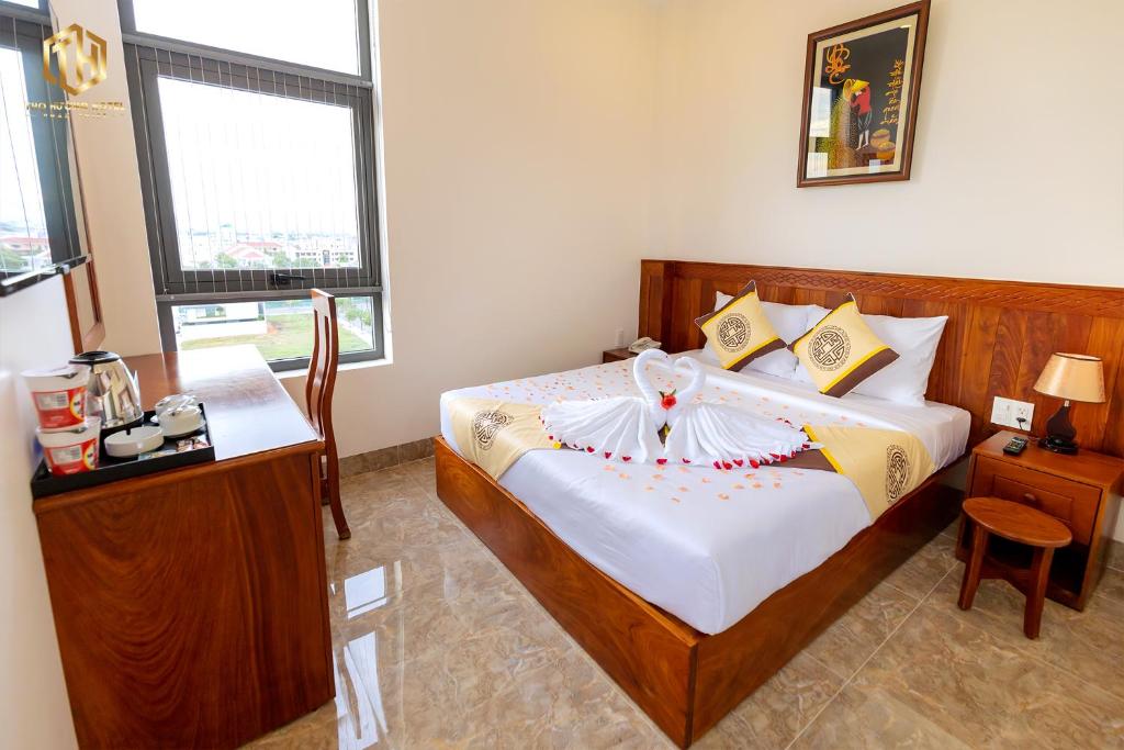 Giường trong phòng chung tại Thọ Hướng Hotel - Phan Thiết