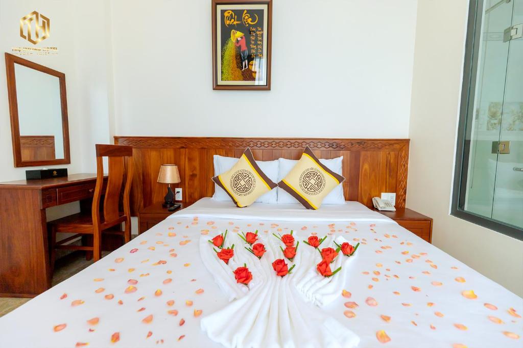 Giường trong phòng chung tại Thọ Hướng Hotel - Phan Thiết