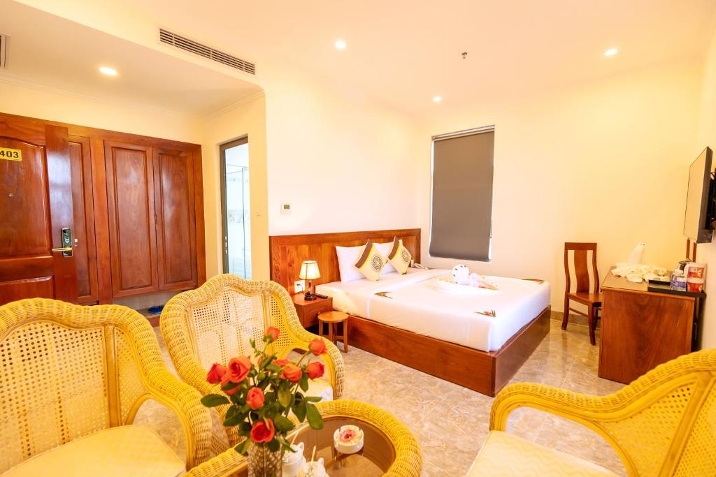 Giường trong phòng chung tại Thọ Hướng Hotel - Phan Thiết