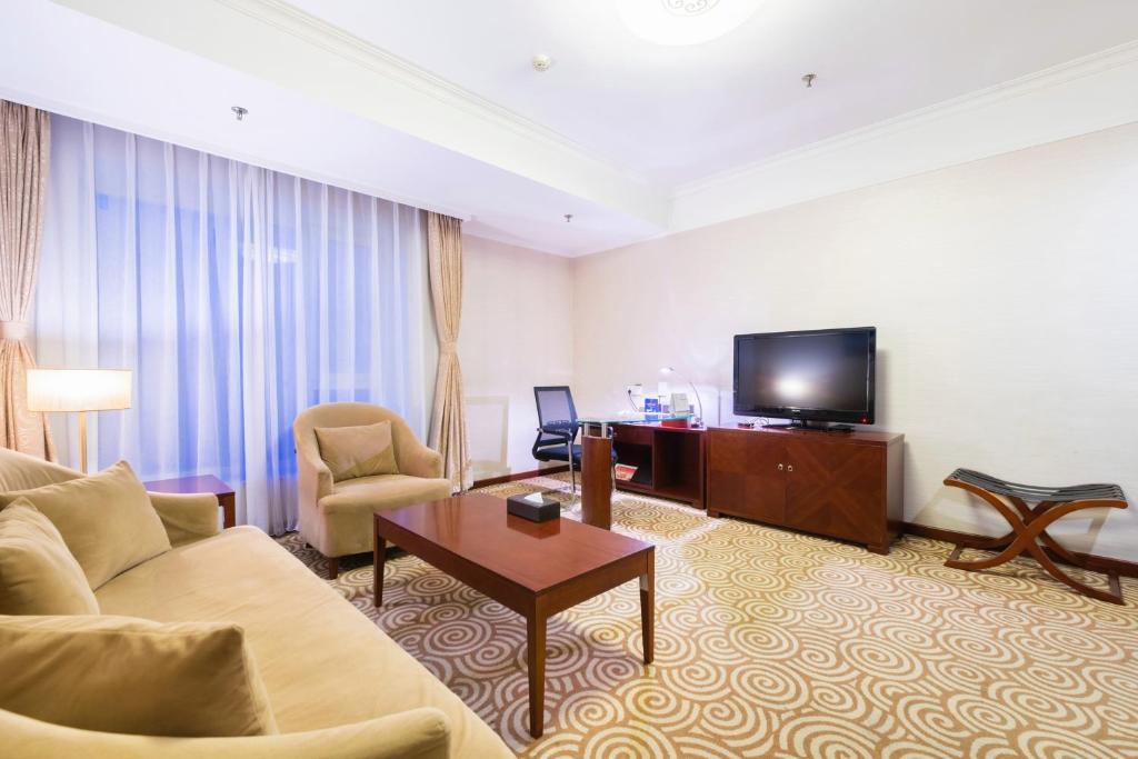 TV a/nebo společenská místnost v ubytování Inner Mongolia Grand Hotel